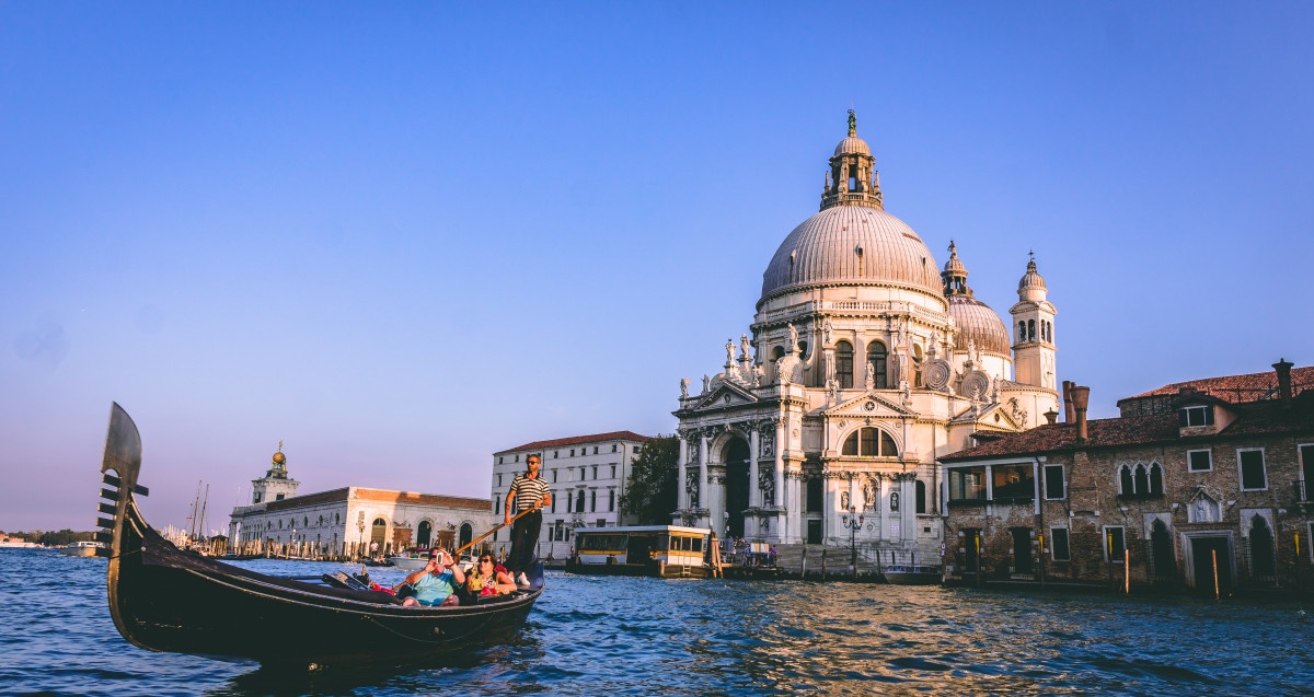 Gondola in front of Salute Church in Venice