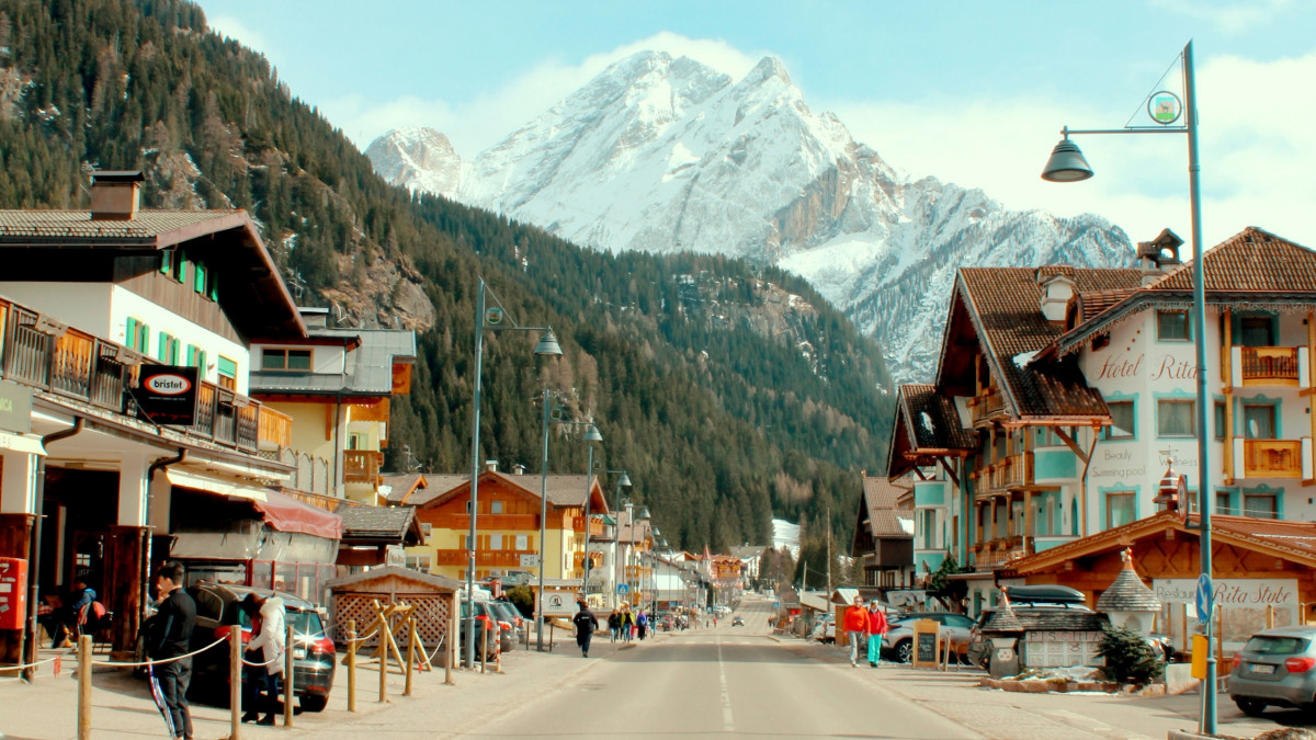 City center of Ortisei with typical houses and the main road