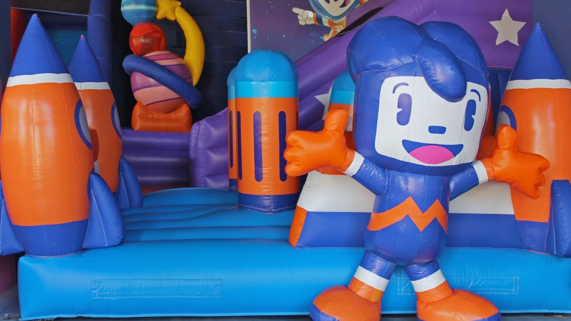 Inflatable Space Jumper attraction for children at Movieland Park in Italy.