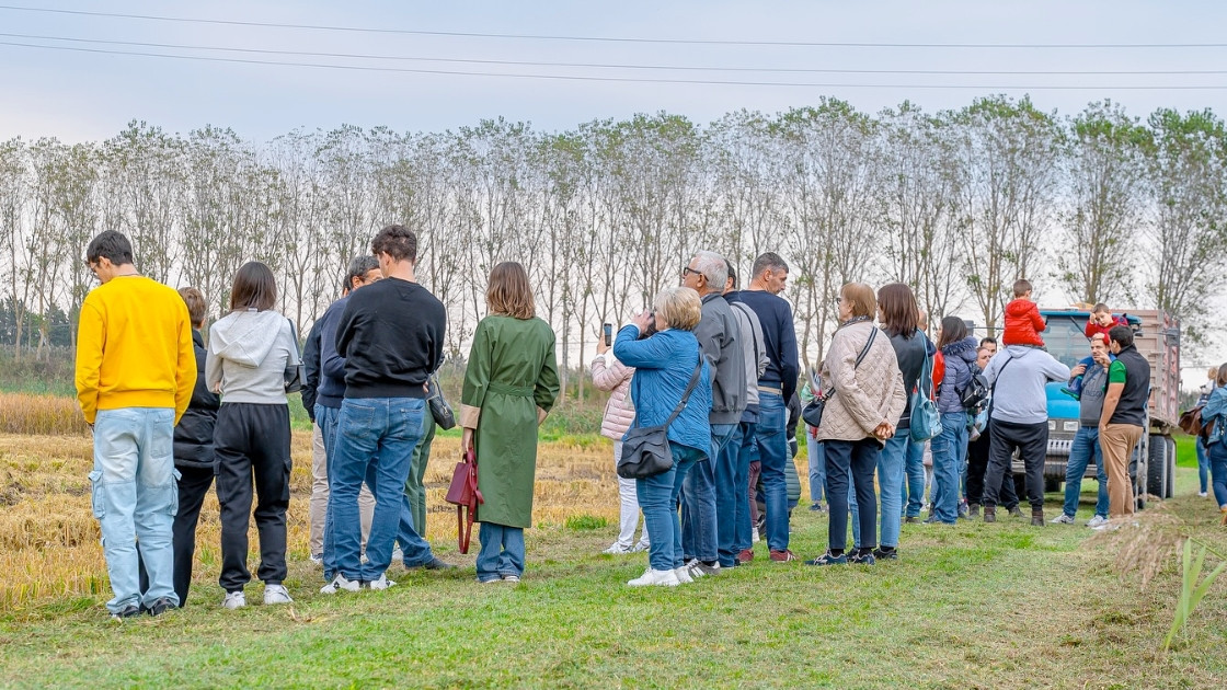 A group of visitors participating in a guided farm tour at Azienda Agricola La Fagiana, learning about local agriculture and rural traditions in Italy.