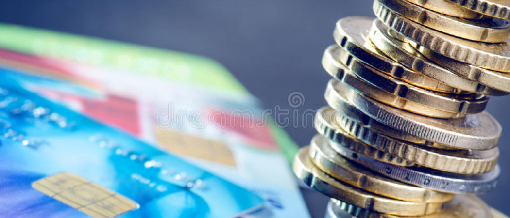 euro-money-credit-cards-dark-background-currency-europe-balance-money-building-coins-83678370
